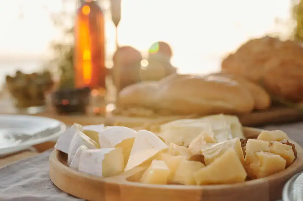 The Picnic Box with varied soft cheeses and fresh bread